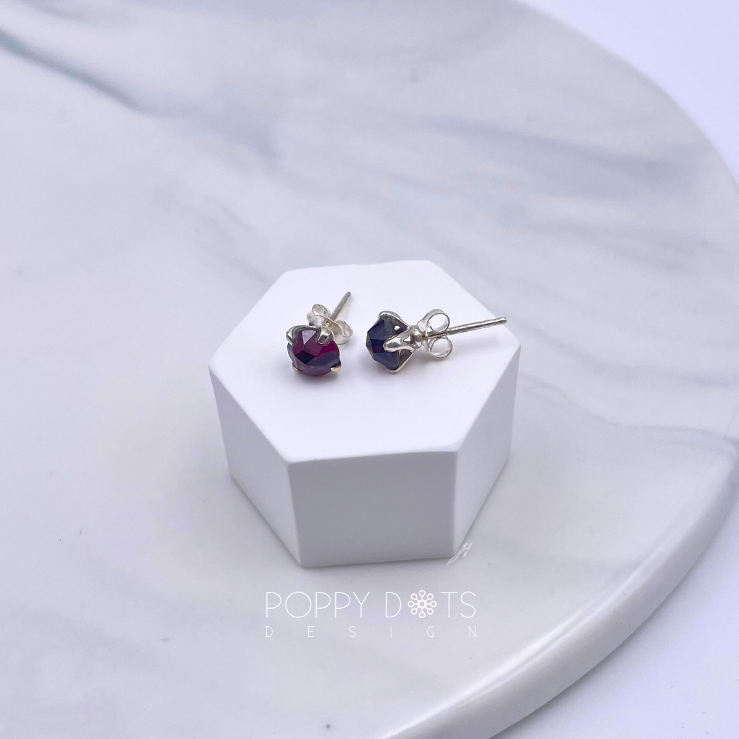 Sterling Silver Garnet Claw Studs