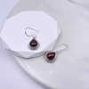 Sterling Silver Bordered Cab Teardrop Garnet Earrings