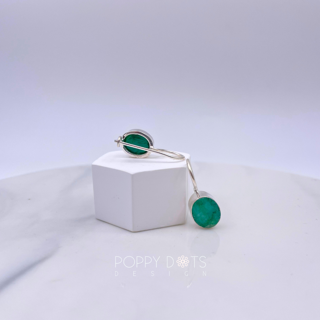 Luxurious Sterling Silver Oval Emerald Earrings