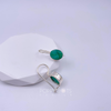 Luxurious Sterling Silver Oval Emerald Earrings