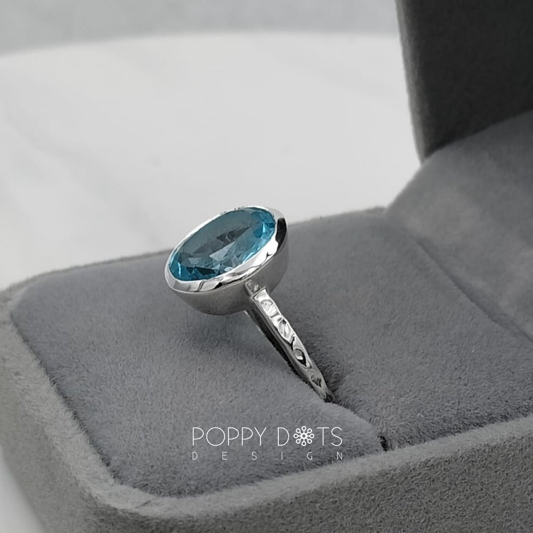 Luxurious Sterling Silver Blue Topaz Oval Ring (10mm x 12mm)